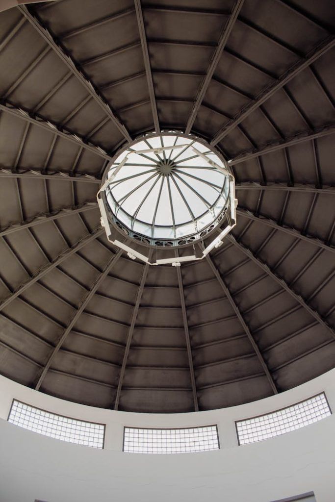 View of a circular modern dome ceiling in Badajoz, Spain, showcasing geometric architectural design.