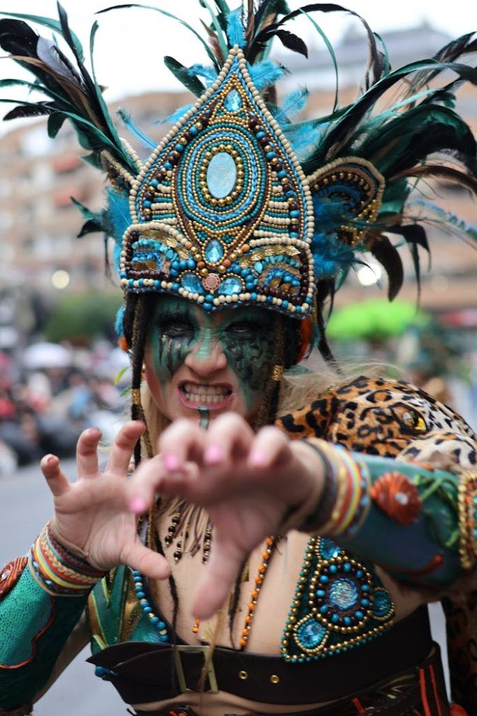 Captured moment of a performer in colorful costume at Badajoz Carnival.
